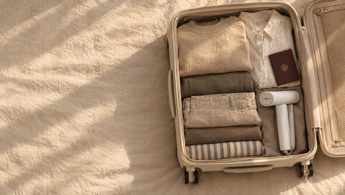 Carry-on suitcase with the folded Nomad steamer